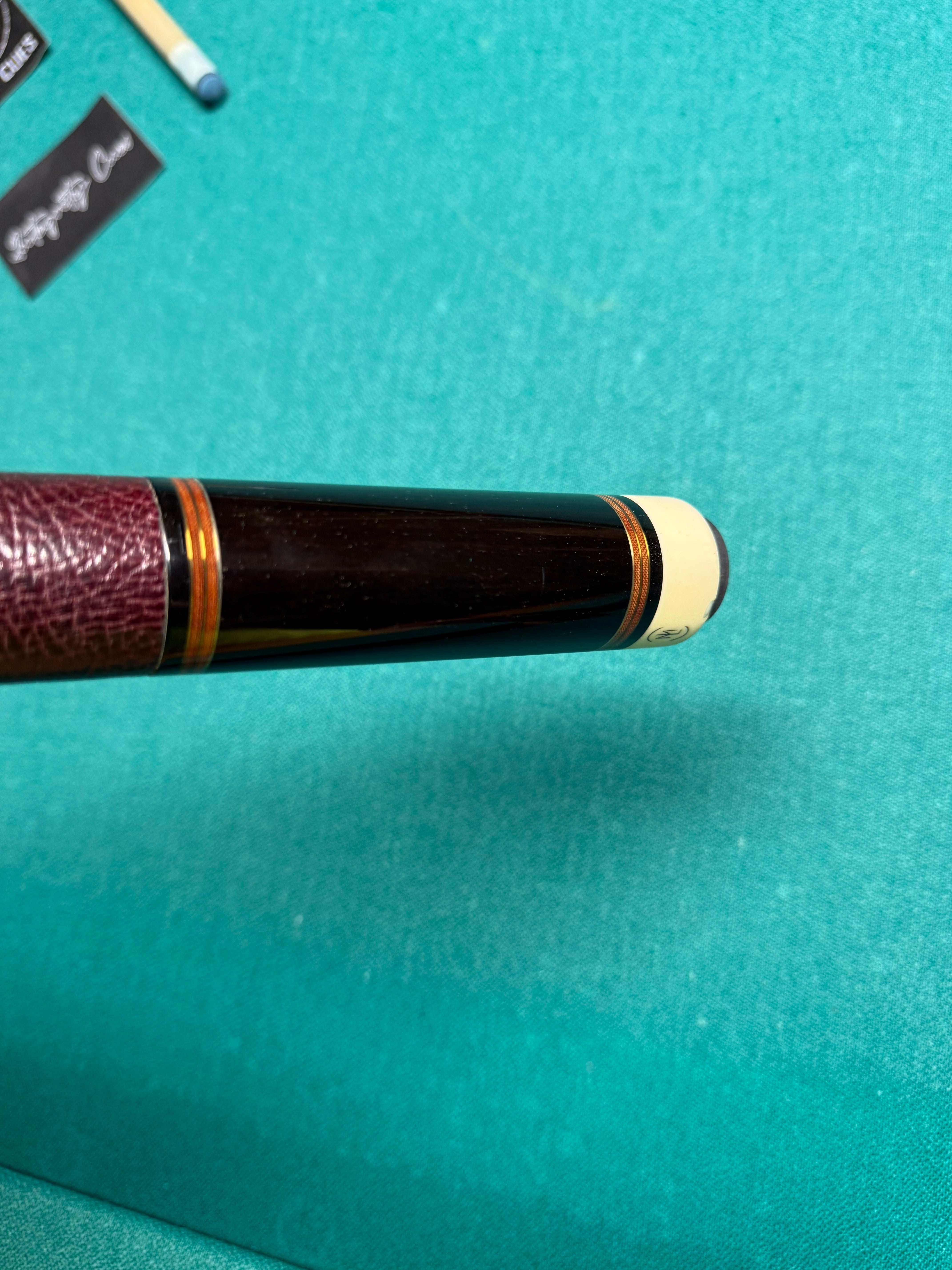 Mike Lambros Preowned 6 Pointer Birdseye Custom Cue