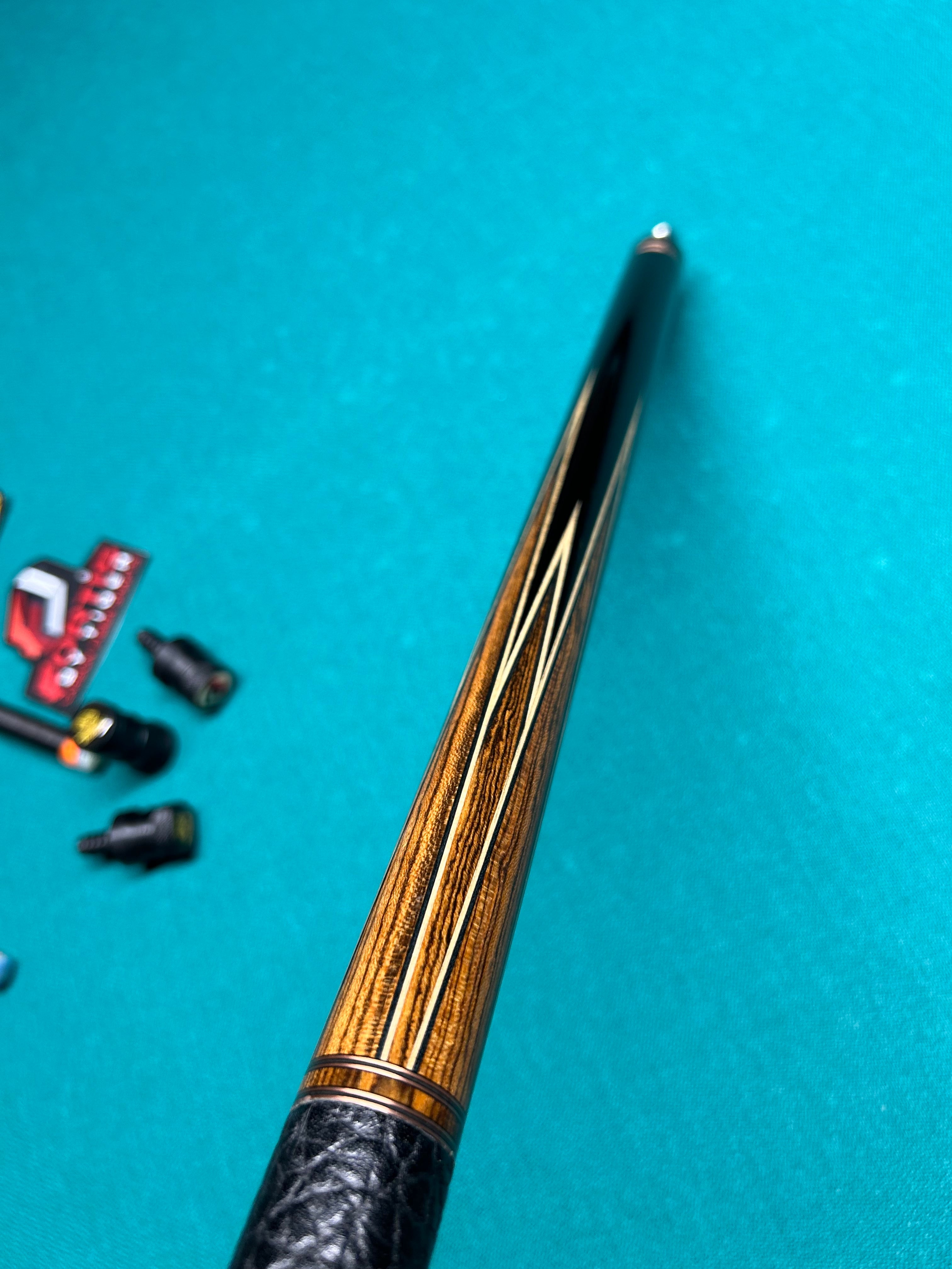 Full Custom 8 Point Tiger Cue made with (2) Incredible Woods, Ebony and Bocote, and Comes with (2) Fortis Carbon Shafts