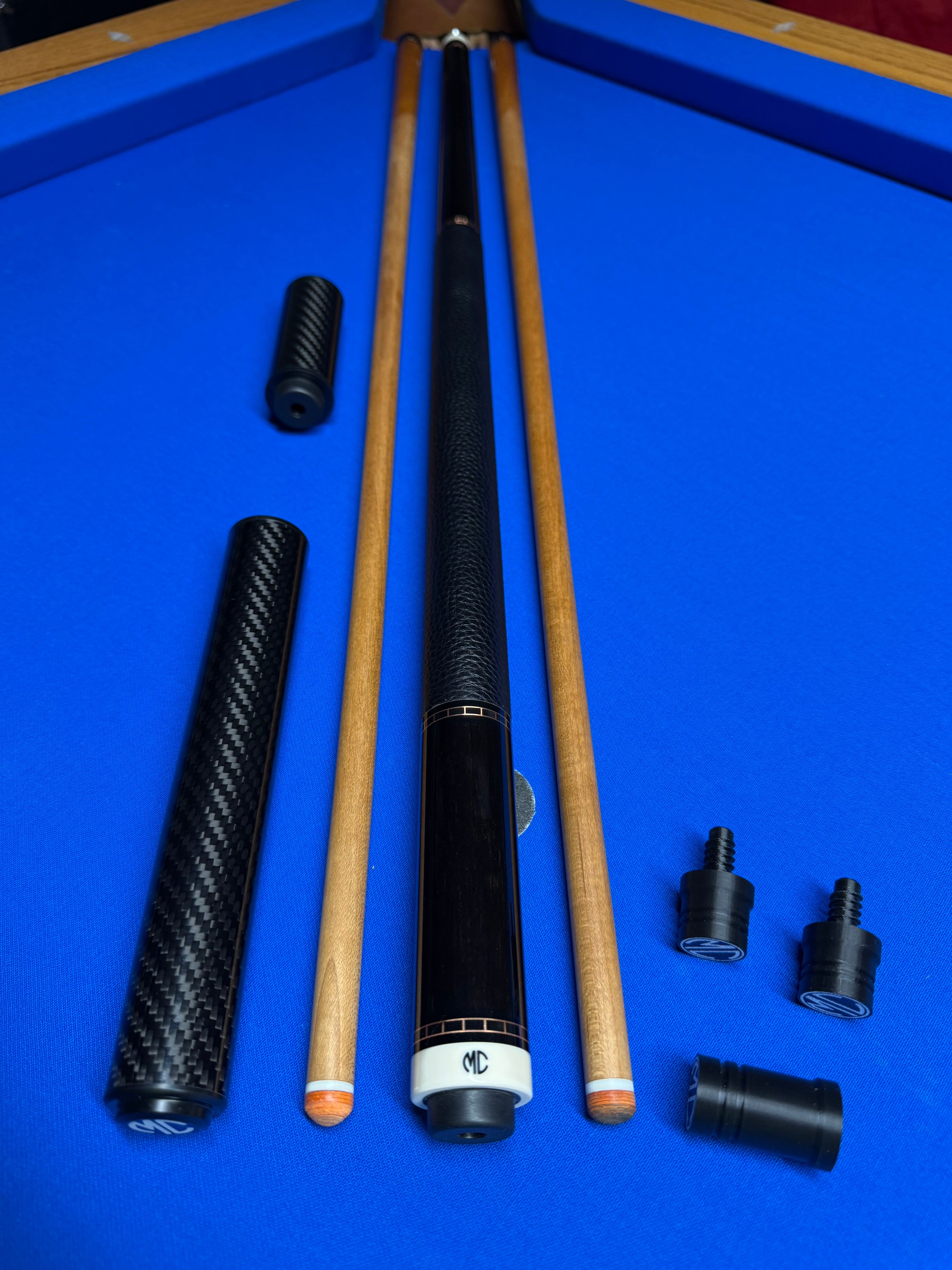 MC Ebony Custom Cue W (2) Kielwood shafts and (2) Extensions