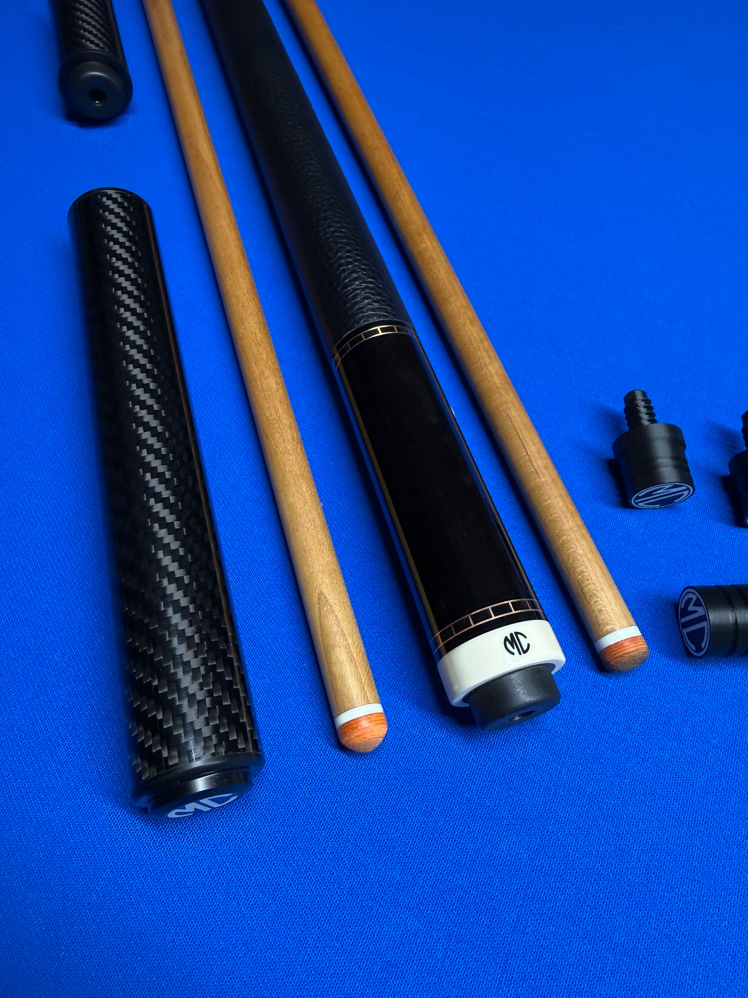 MC Ebony Custom Cue W (2) Kielwood shafts and (2) Extensions